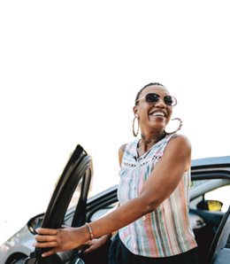 Woman stepping out of her car