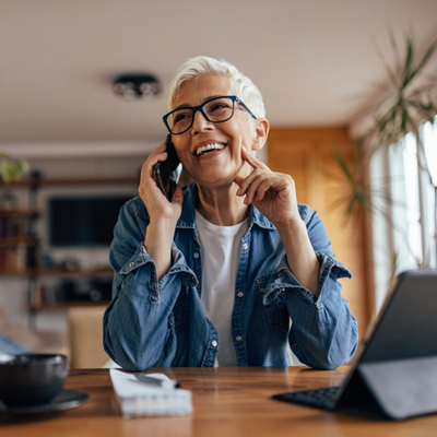 Image of older woman on the phone.