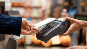 Image of someone using their smartphone to tap to pay
